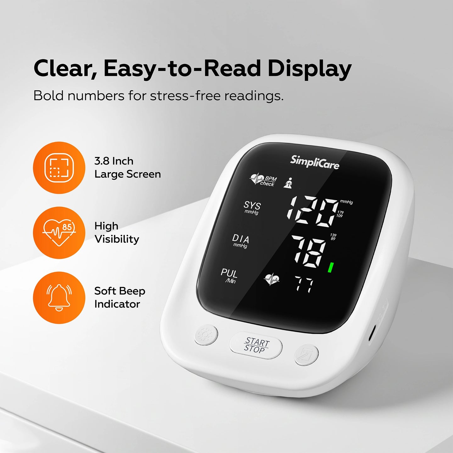 Digital blood pressure monitor with clear display and features highlighted on a light gray background