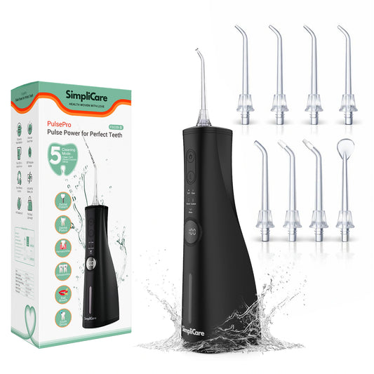 Black dental water flosser with packaging and multiple nozzles on a white background