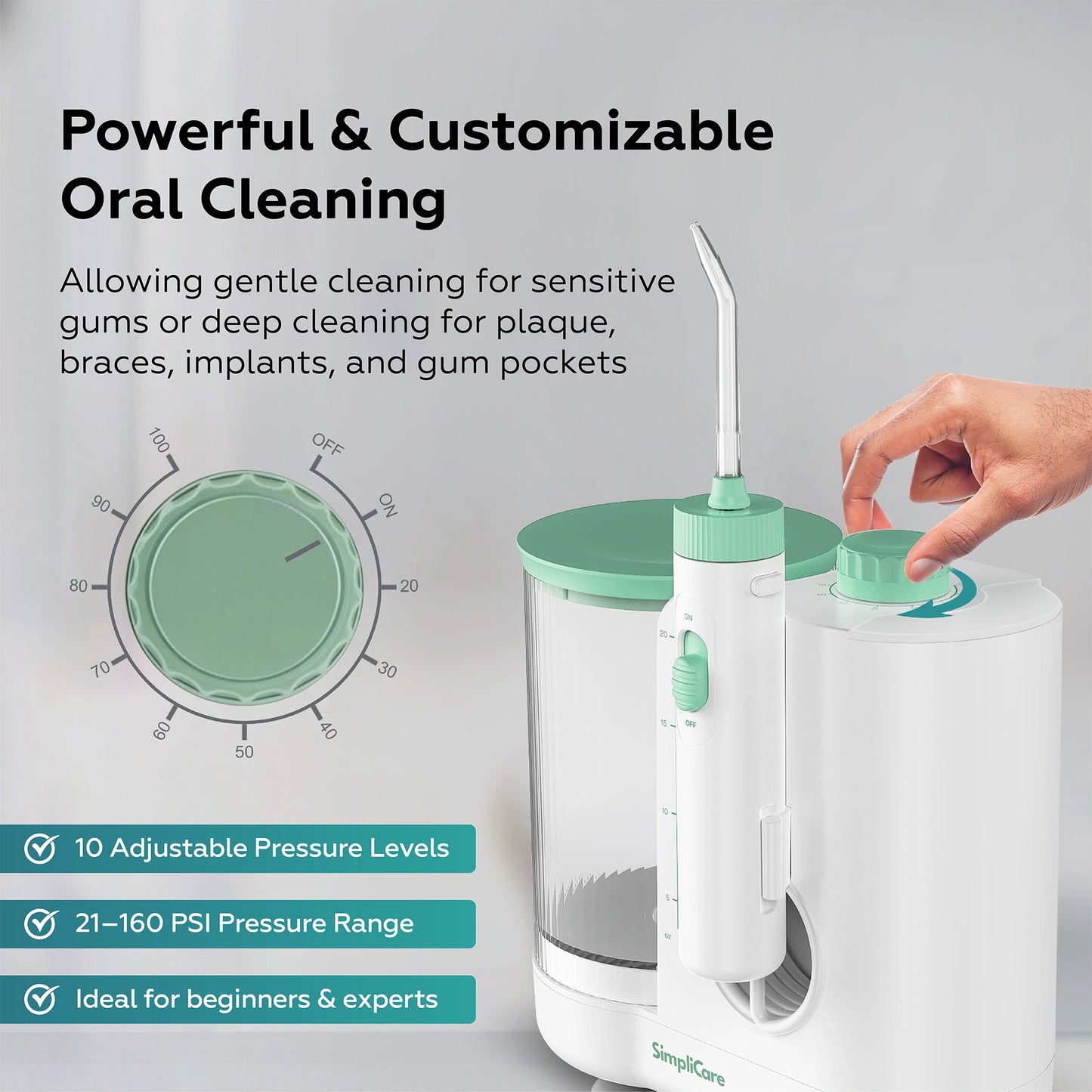 Oral cleaning device with adjustable pressure levels and hand holding it, on a light gray background.